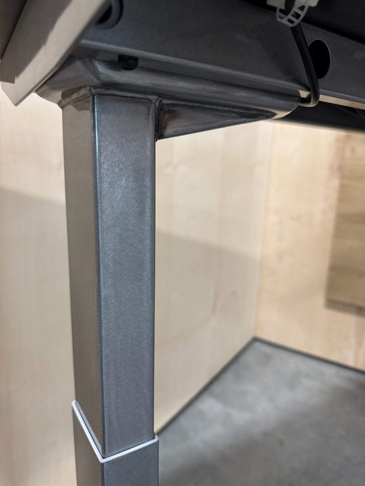 Peak Two-Leg standing desk frame in alloy silver