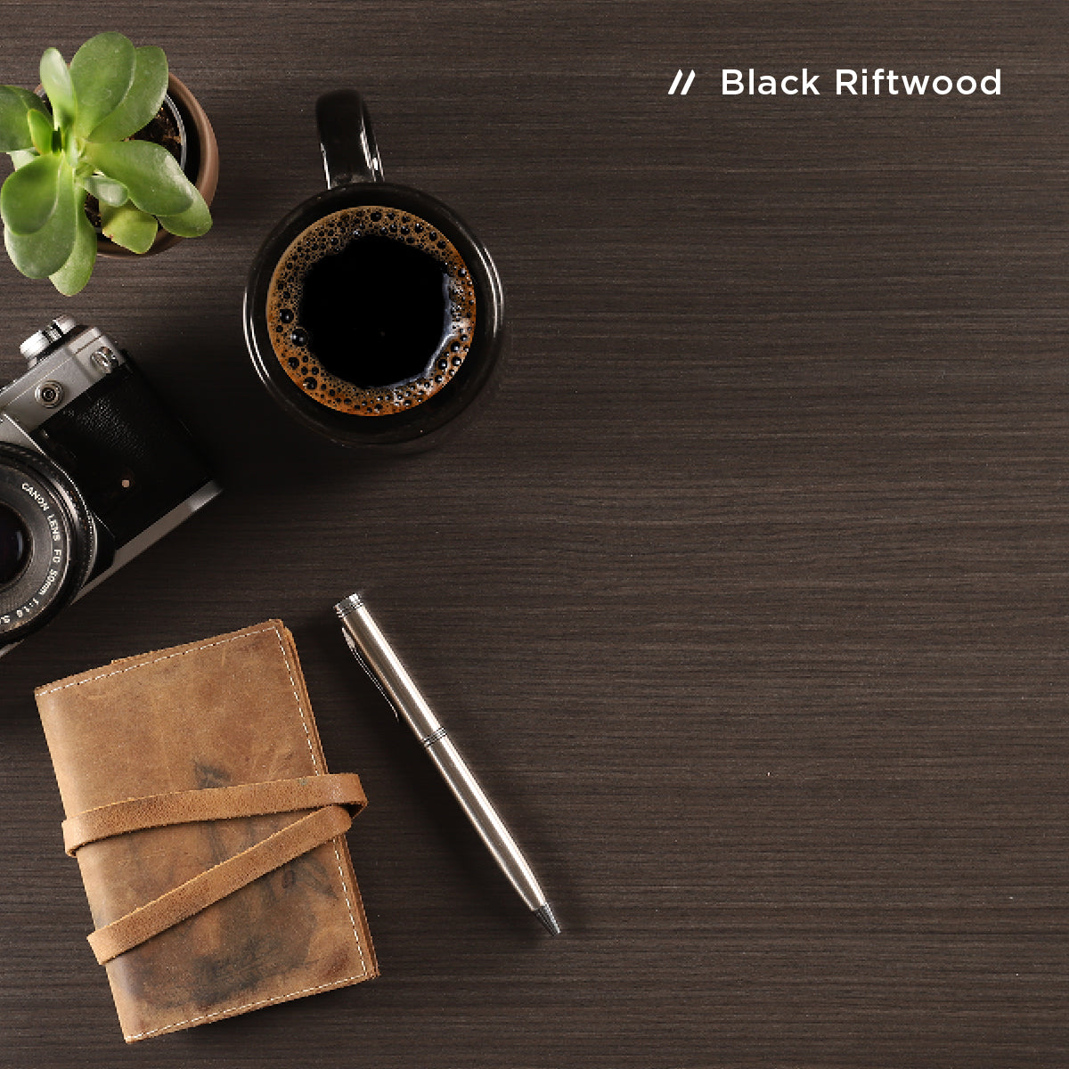 Black Riftwood high-pressure laminate desktop finish, close-up swatch
